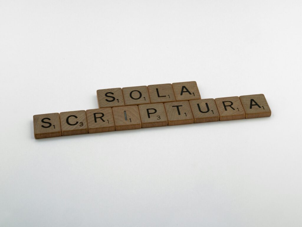 Brown Wooden Scrabble Tiles on White Surface